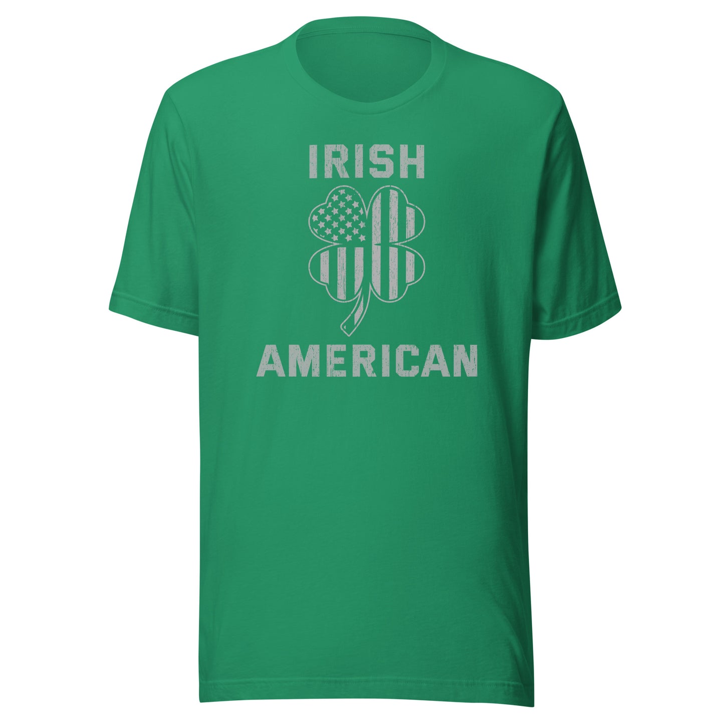 St. Pattys Day tee featuring the words Irish American in bold font with a clover leaf.  The clover has an American Flag silhouette within it. Shirt color is kelly green.